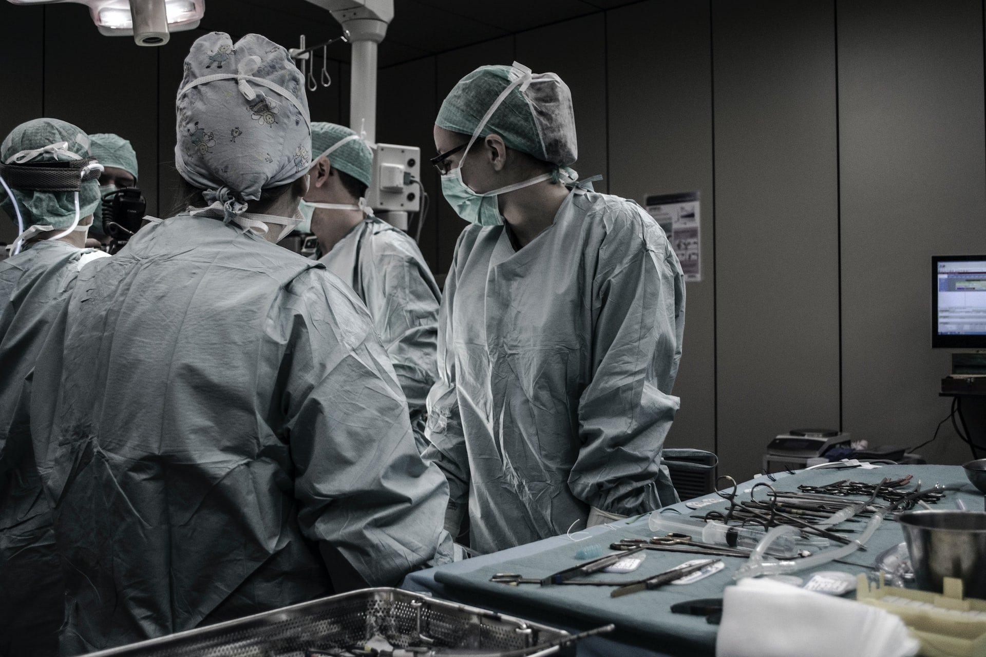 A surgical team in an operating theatre.